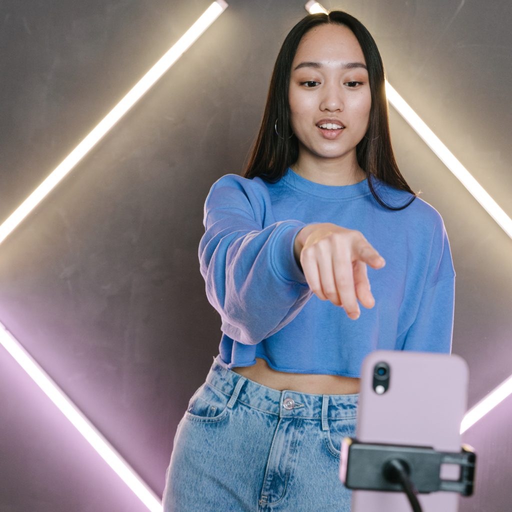 Woman filming for her social media video